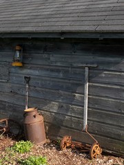 Vintage Farm tools next to the barn