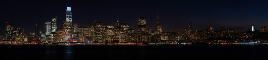 Downtown San Francisco Ca. and the water front at night under there lights