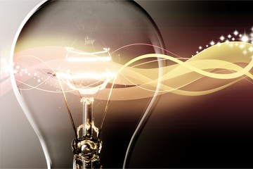 Standard Incandescent Light Bulb on Grey Background