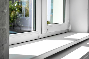 Fototapeta na wymiar Modern window indoors, closeup view. Home interior