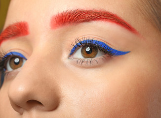 Fototapeta premium Young woman with dyed eyebrows, closeup