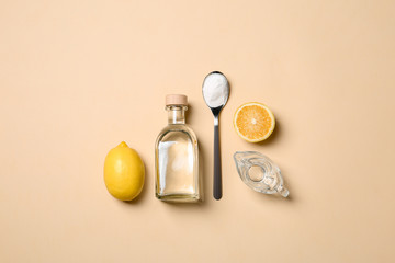 Flat lay composition with vinegar on color background