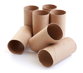 Empty paper toilet rolls on white background