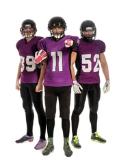 Foto op Canvas American football players in uniform on white background © New Africa