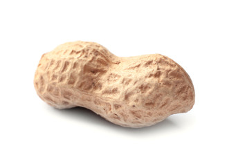 Raw peanuts in pod on white background