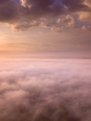Beautiful foggy sunrise landscape from drone.