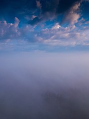 Beautiful foggy sunrise landscape from drone.