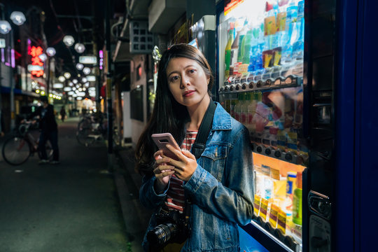 Japanese Woman Relying On Japan Vending Machines