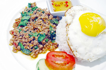 Pork spicy basil sauce with rice.