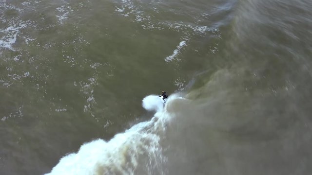 Surfers riding waves at Belmar in New Jersey