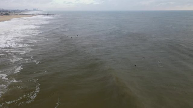 Drone shot of surfers in the water at Belmar, New Jersey.