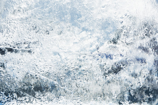 The texture of the ice. The frozen water.Winter background © Ольга Васильева