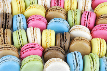 close up on colorful macarons food background