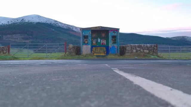 Cinematic shot of a painted bus stop in Dumfries and Galloway, Scotland