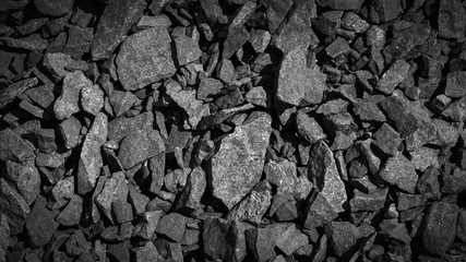 rubble texture natural abstract dark black and white vignette background close-up