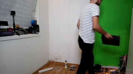 Bearded gamer is changing his old desk to new electric one.