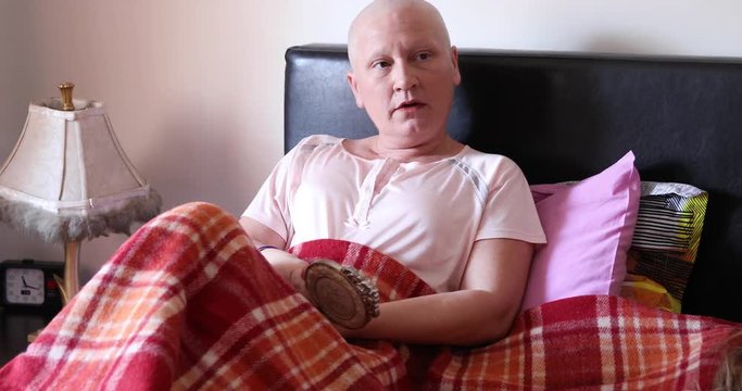 Sad cancer patient with mirror