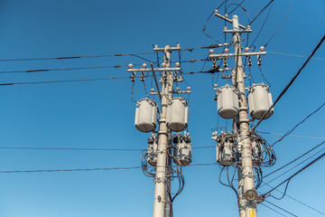 Electricity pole with transformer in Japan.