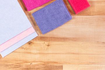 Colorful accessories for cleaning surfaces and rooms at home, place for inscriptions