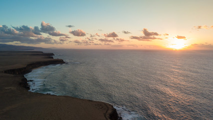 aerial view west coast of Fuerteventura at sunset