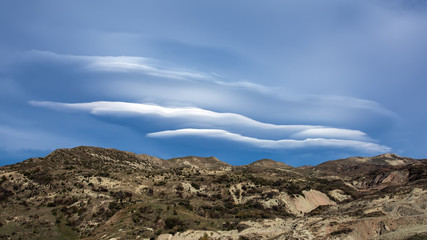 Fototapeta na wymiar Amazing beautiful cloud over the mountain range