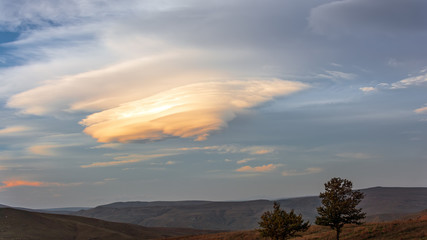 Amazing beautiful cloud over the mountain range