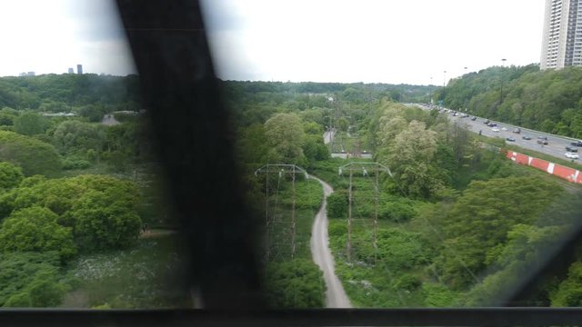 View Of Don Valley Through Subway Car Window. Travelling On The TTC Going West On The Bloor Line. Summer In Toronto.