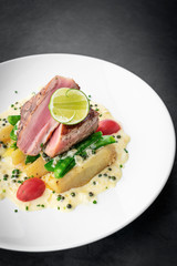 fresh seared tuna steak with creamy mustard and pepper sauce