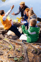 Fototapeta premium So active. Positive active children looking at their teacher while participating in the discussion