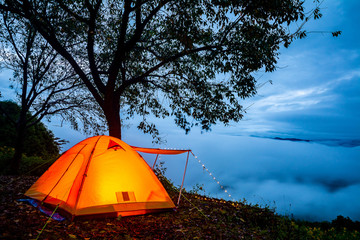 Camping orange tent at Hua Mae Kham forest park on Doi Mae Salong in Chiang Rai,Thailand.