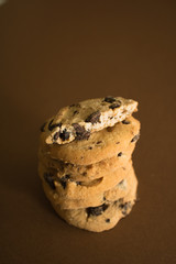 chocolate cookies on the brown background