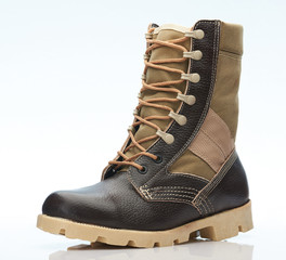 7526751 One brown military tall shoe