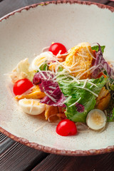 Chicken Salad. Chicken Caesar Salad. Caesar Salad with grilled chicken on plate