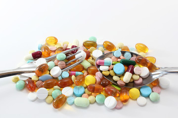 Medical meal of various colorful medicine drugs, pills, capsules, tablets. Concept for human eat a lot of drugs for everyday.