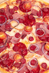 Italian fast food. Delicious hot pizza sliced and served on wooden platter isolated on white background