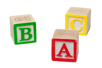 Wooden alphabet blocks isolated on white background