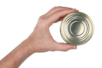 An elderly man holds in his hand a closed can of canned food. Isolated
