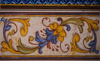 Detail of the traditional tiles from facade of old house. Decorative tiles.Valencian traditional tiles. Floral ornament.