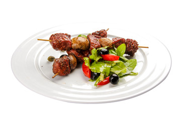 Suvlaki. A traditional Greek dish. On a white background