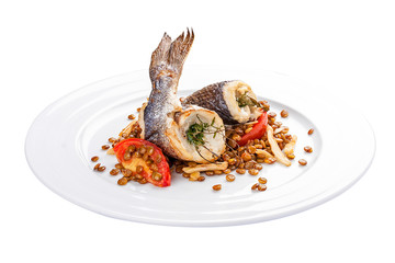 Dorada with lentils and tomatoes. A traditional Spanish dish. On a white background