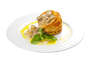 Volovan is a savory snack. A traditional French dish. On a white background