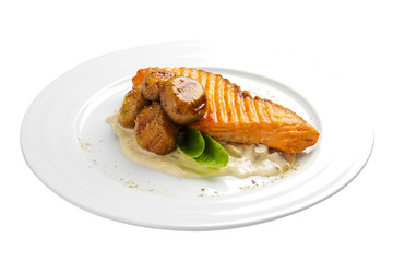 Lax with mushrooms. A traditional Danish dish. On a white background