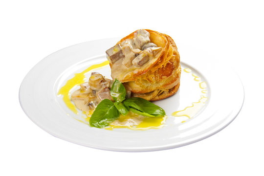 Volovan is a savory snack. A traditional French dish. On a white background