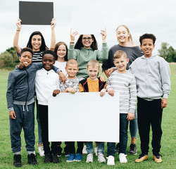 Group of diverse kids supporting a movement