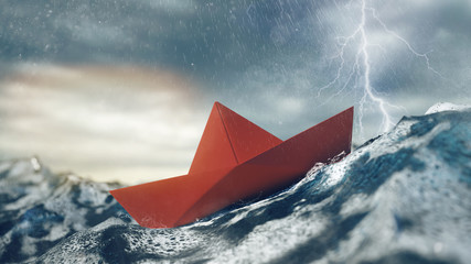 Risiko Konzept mit Papierboot im Sturm auf Meer - obrazy, fototapety, plakaty