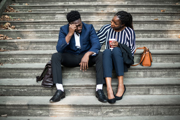 Woman consoling her colleague