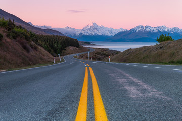 Road to Aoraki Mount Cook at twilight pink sky in NEw Zealand