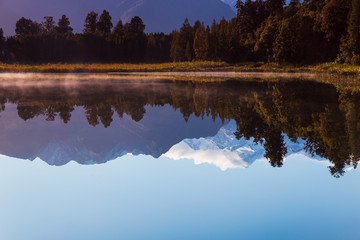Perfectly reflection of Mount Cook on the Lake Matheson in Fox Glacier, West Coast, New Zealand in the morning