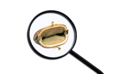 Empty wallet under a magnifying glass