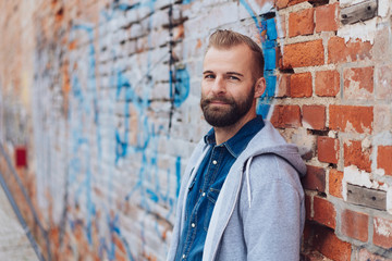 Side portrait of young man outdoors